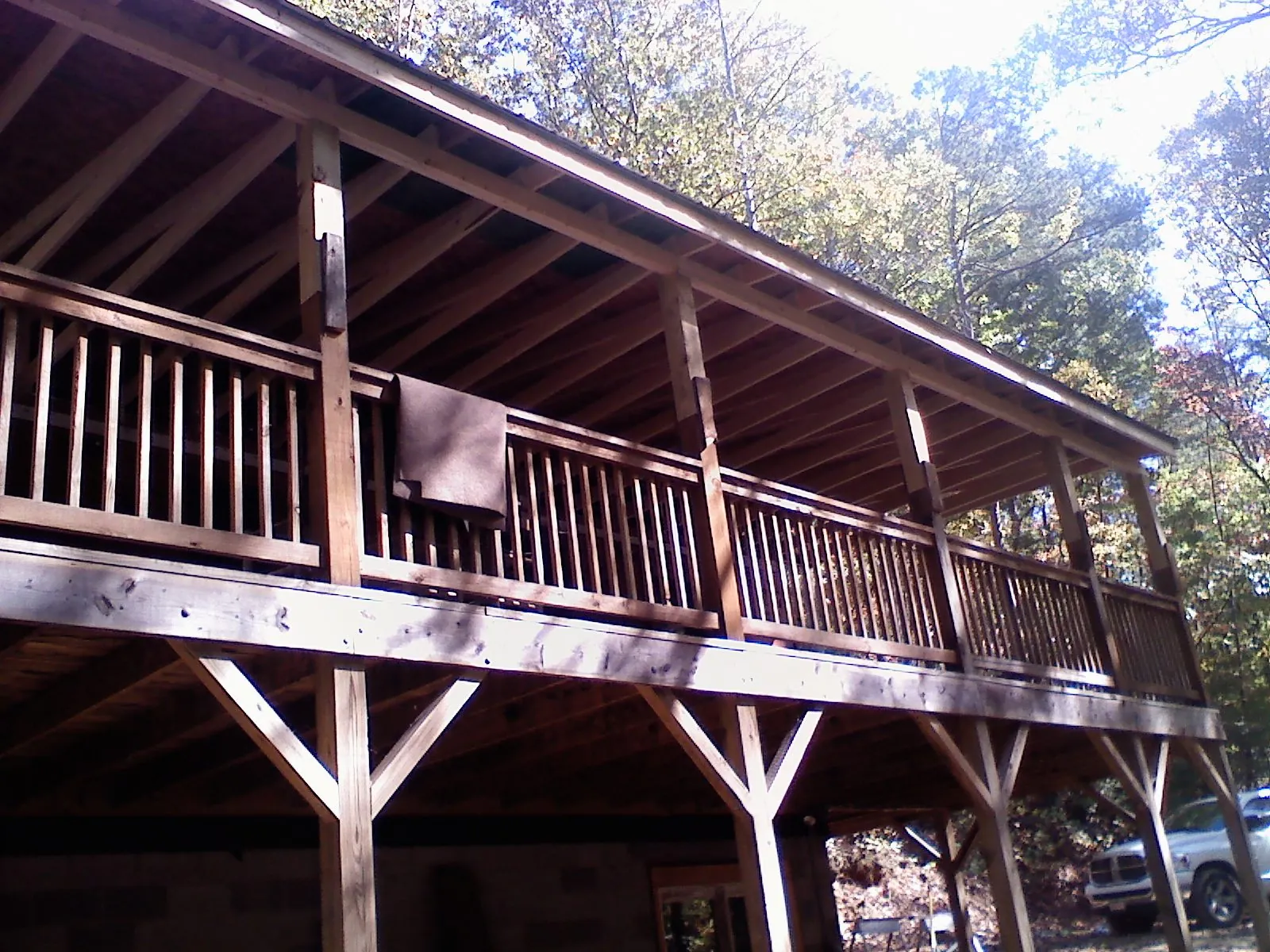 Timber framing under a new elevated porch and deck — Roof Leak Repair in Creal Springs by Roofing Brothers